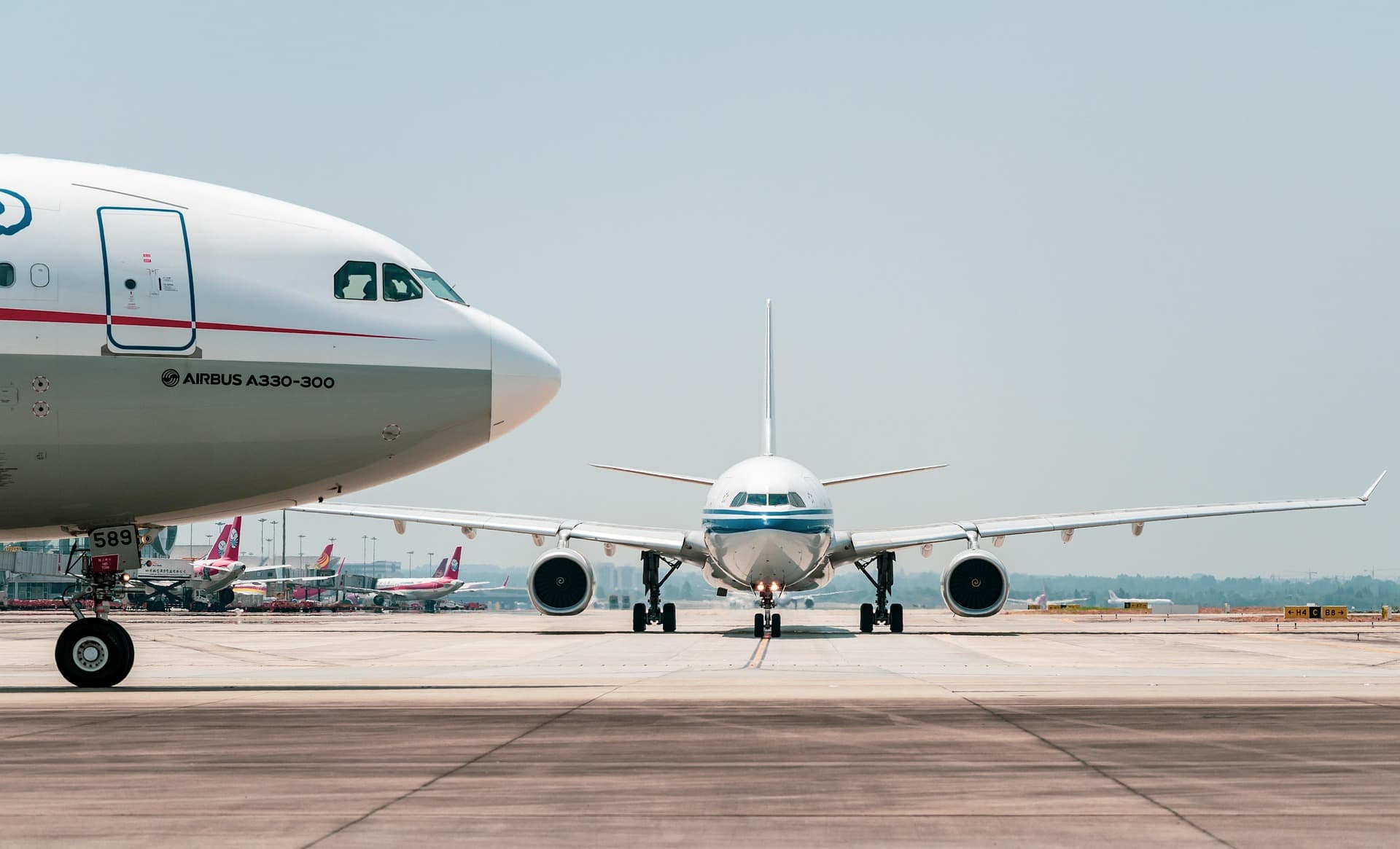 A picture of commercial jets in the airport